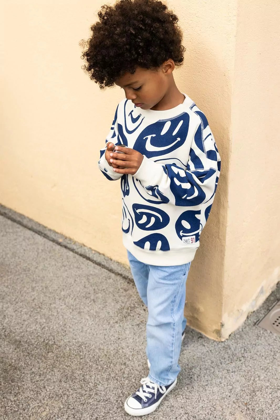 Sweater mit Smiley-Allover-Print